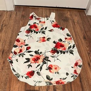 Wilfred Floral Size Small top.
100% Polyester 
Trim 100% Silk